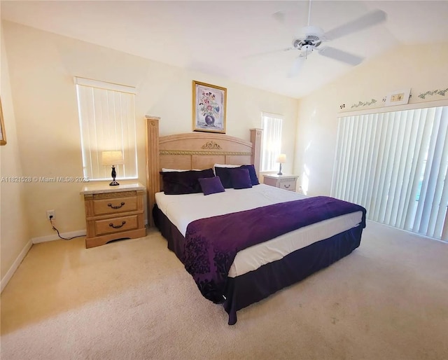 357 Moscato Dr, Davenport, FL 33897 - bedroom with light colored carpet, vaulted ceiling, and a ceiling fan