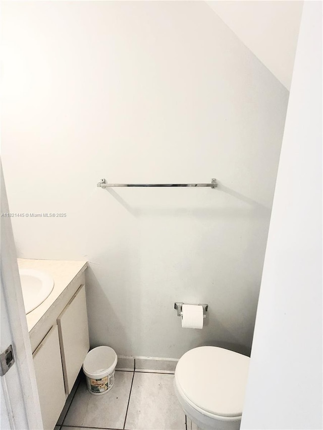 3973 W 9th Ln Unit 3, Hialeah, FL 33012 - half bathroom featuring vanity and tile patterned floors