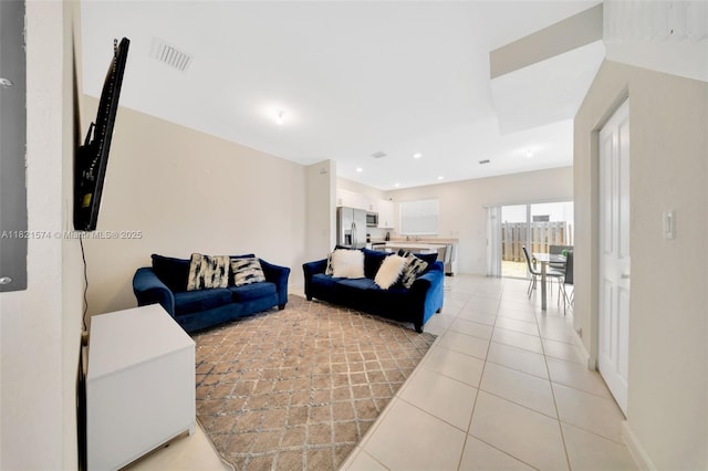 2699 SE 19th St, Homestead, FL 33035 - living room with light tile patterned floors