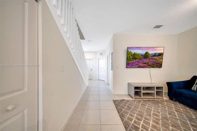 2699 SE 19th St, Homestead, FL 33035 - hall with stairs and tile patterned flooring