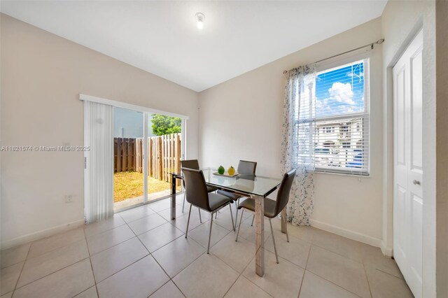 2699 SE 19th St, Homestead, FL 33035 - dining area featuring baseboards and light tile patterned flooring