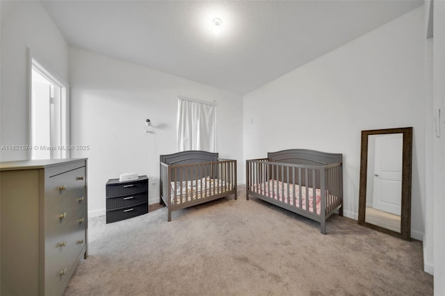 2699 SE 19th St, Homestead, FL 33035 - carpeted bedroom featuring vaulted ceiling and baseboards