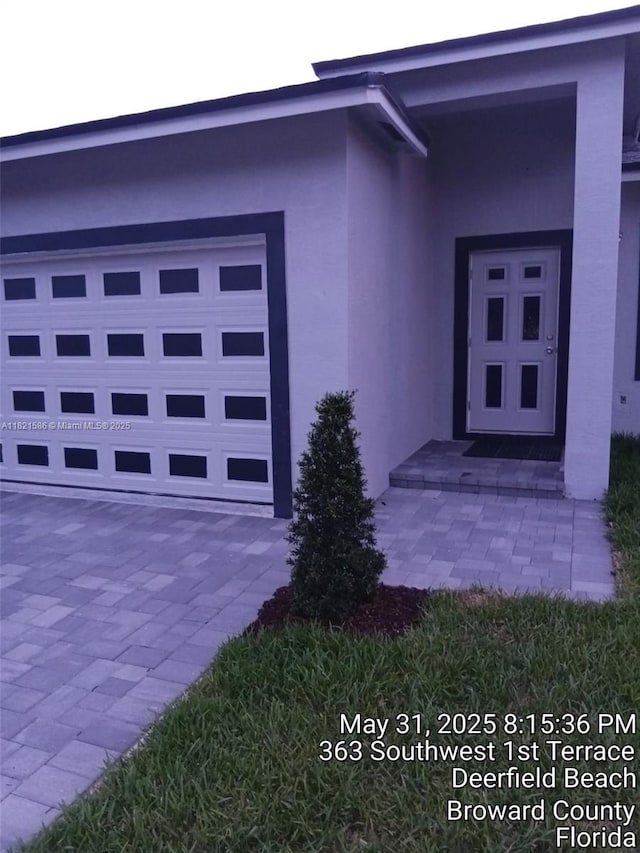 363 SW 1st Ter, Deerfield Beach, FL 33441 - entrance to property featuring stucco siding