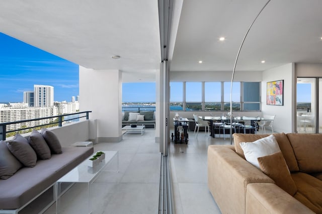 11 Island Ave Unit Ph2, Miami Beach, FL 33139 - tiled living area featuring recessed lighting, a city view, and a water view