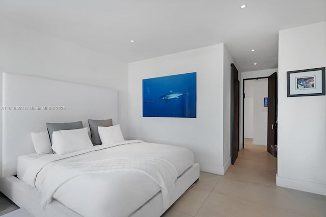 11 Island Ave Unit Ph2, Miami Beach, FL 33139 - bedroom featuring recessed lighting and light tile patterned floors