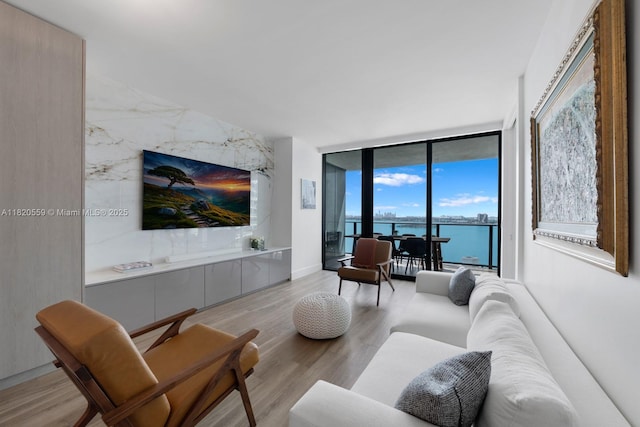 650 NE 32nd St Unit 1904, Miami, FL 33137 - living area featuring floor to ceiling windows and light wood finished floors