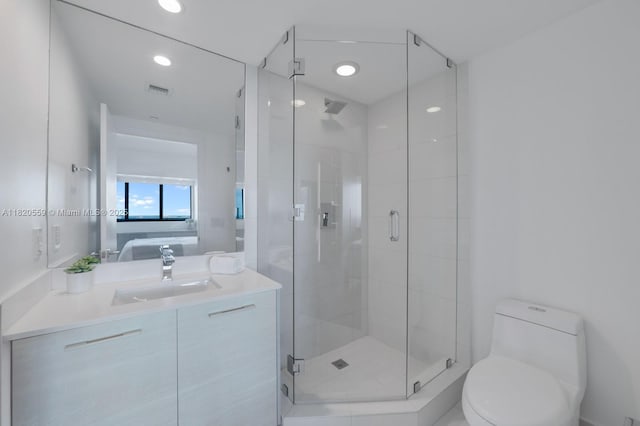 650 NE 32nd St Unit 1904, Miami, FL 33137 - bathroom featuring vanity, a stall shower, ensuite bathroom, and recessed lighting