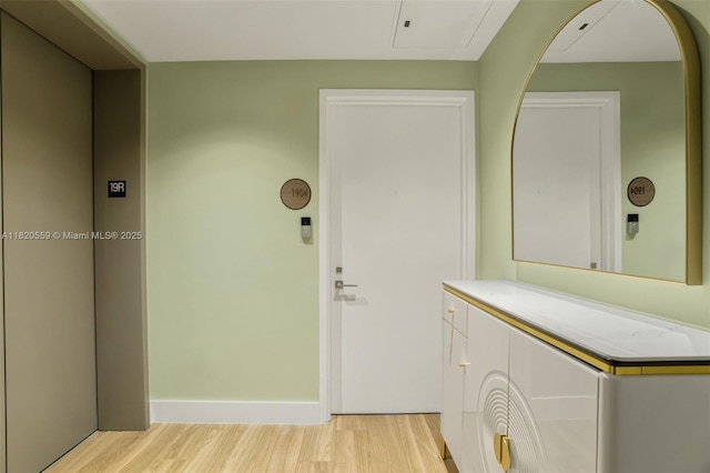 650 NE 32nd St Unit 1904, Miami, FL 33137 - hall featuring elevator and light wood-style flooring