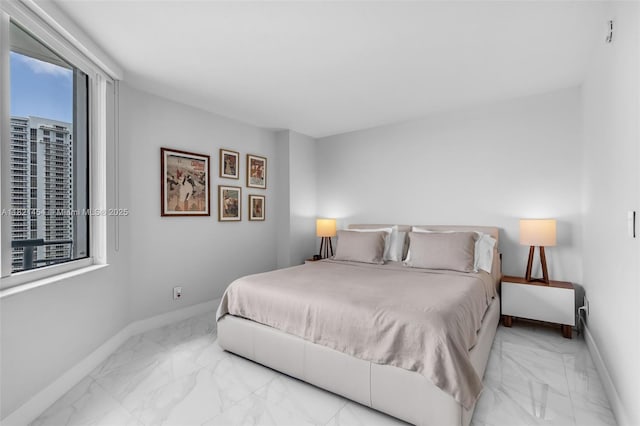 325 S Biscayne Blvd Unit 2515, Miami, FL 33131 - bedroom with marble look tiles and baseboards