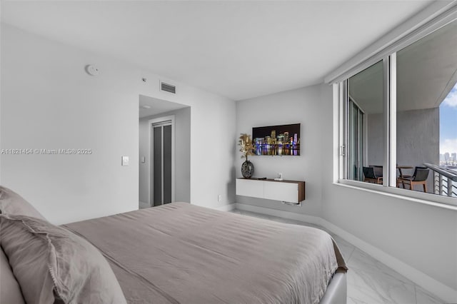 325 S Biscayne Blvd Unit 2515, Miami, FL 33131 - bedroom featuring marble look tile flooring and baseboards