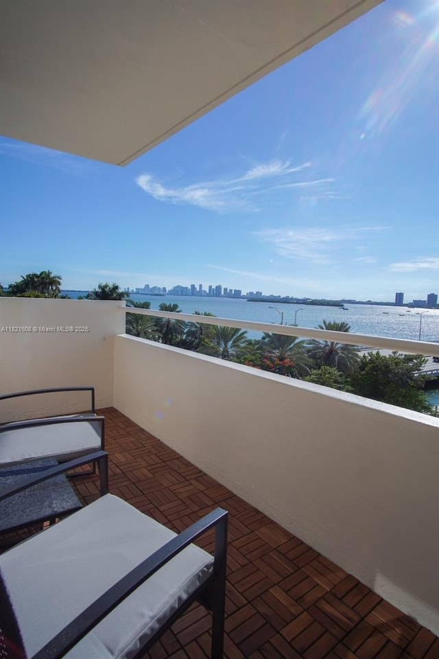 7904 W Dr Unit 501, North Bay Village, FL 33141 - balcony with a water view and a view of city