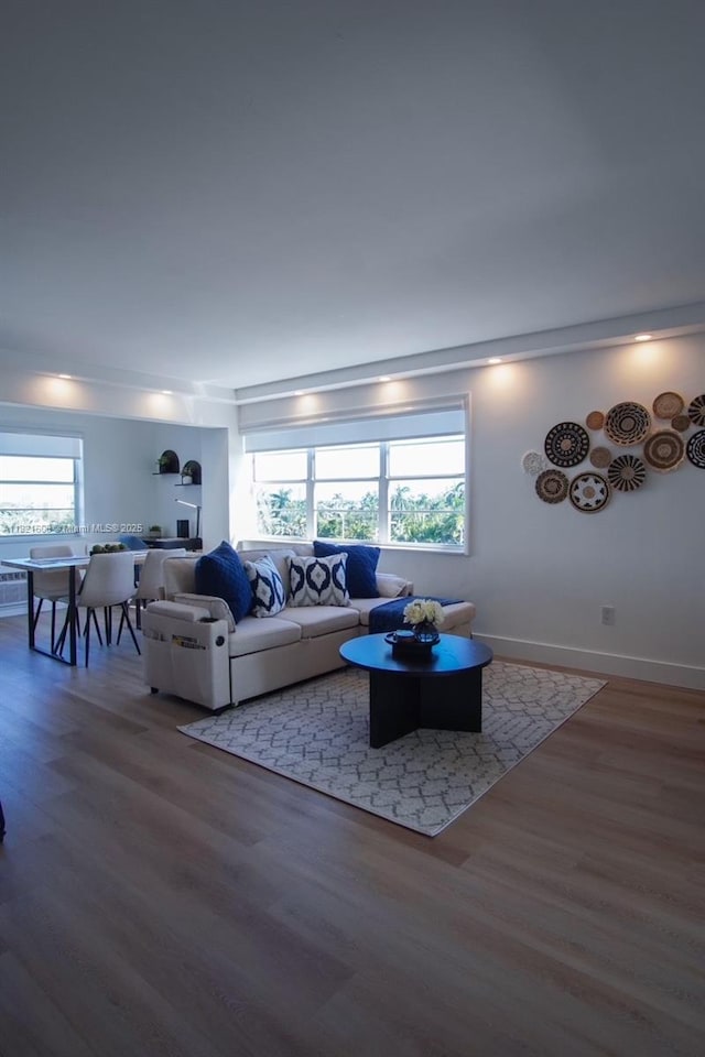 7904 W Dr Unit 501, North Bay Village, FL 33141 - living room featuring wood finished floors