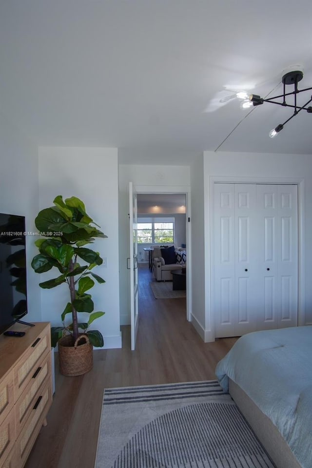 7904 W Dr Unit 501, North Bay Village, FL 33141 - bedroom featuring wood finished floors