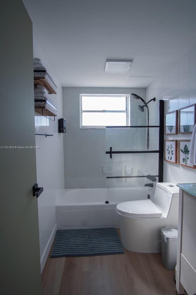 7904 W Dr Unit 501, North Bay Village, FL 33141 - bathroom featuring shower / tub combination, wood finished floors, and vanity