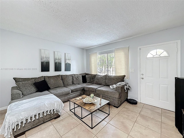 1782 W 42nd St Unit 1782, Hialeah, FL 33012 - living room with a textured ceiling and light tile patterned floors