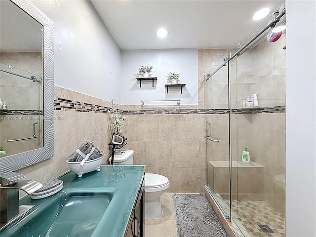 1782 W 42nd St Unit 1782, Hialeah, FL 33012 - full bath with tile walls, a shower stall, double vanity, a wainscoted wall, and recessed lighting