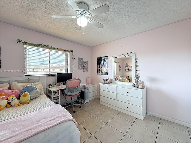 1782 W 42nd St Unit 1782, Hialeah, FL 33012 - bedroom featuring light tile patterned floors, a textured ceiling, and ceiling fan