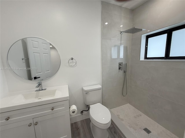 240 SW 55th Ave, Miami, FL 33134 - full bathroom featuring a tile shower, vanity, and wood finished floors
