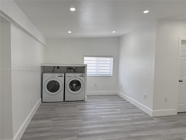 240 SW 55th Ave, Miami, FL 33134 - washroom featuring washing machine and dryer, recessed lighting, and wood finished floors
