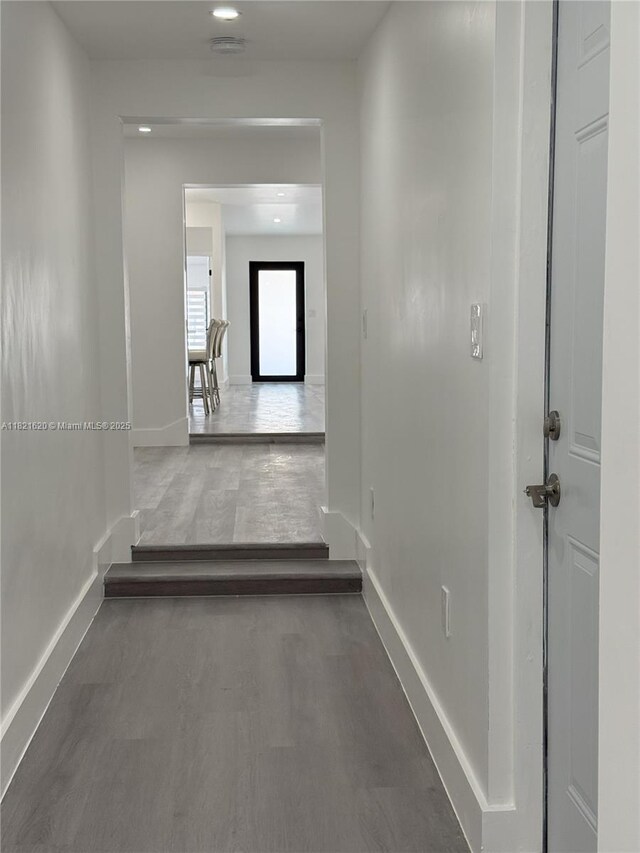 240 SW 55th Ave, Miami, FL 33134 - corridor with baseboards and wood finished floors