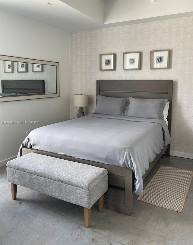 151 SE 1st St Unit 2406, Miami, FL 33131 - bedroom with concrete flooring and baseboards