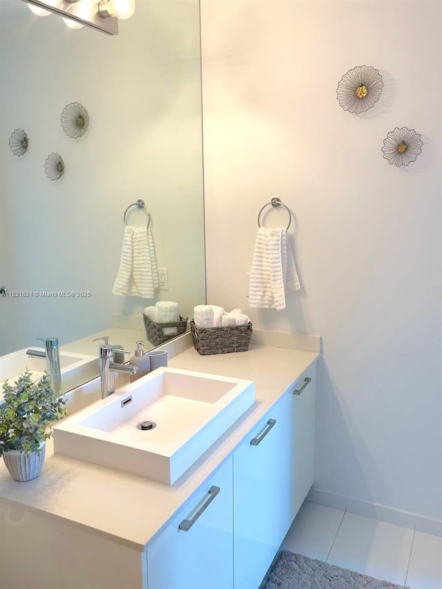 151 SE 1st St Unit 2406, Miami, FL 33131 - bathroom with vanity and tile patterned flooring