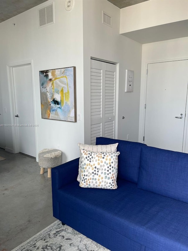 151 SE 1st St Unit 2406, Miami, FL 33131 - living room with finished concrete floors