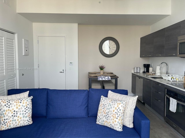 151 SE 1st St Unit 2406, Miami, FL 33131 - living room with concrete floors