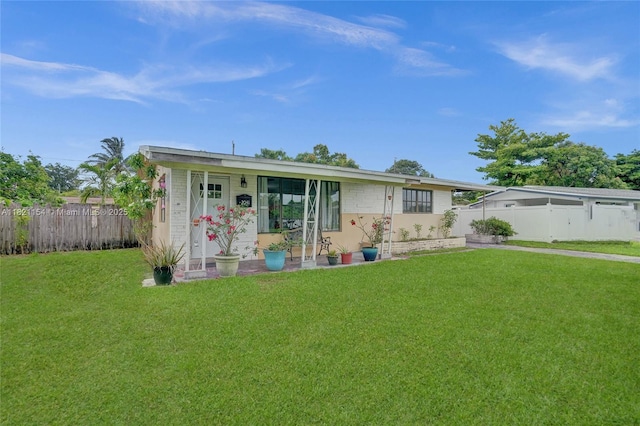 2041 Arcadia Dr, Miramar, FL 33023 - view of front of house featuring a fenced backyard