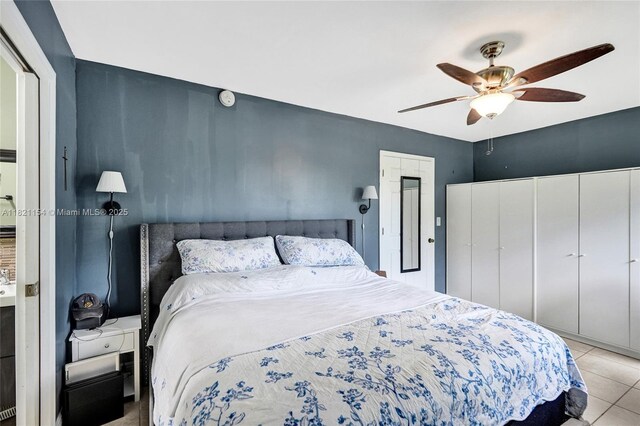 2041 Arcadia Dr, Miramar, FL 33023 - bedroom featuring light tile patterned floors, a closet, and ceiling fan