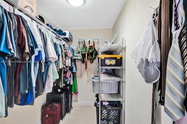 2041 Arcadia Dr, Miramar, FL 33023 - spacious closet featuring tile patterned floors