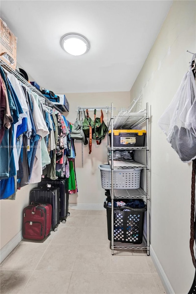 2041 Arcadia Dr, Miramar, FL 33023 - walk in closet featuring tile patterned floors