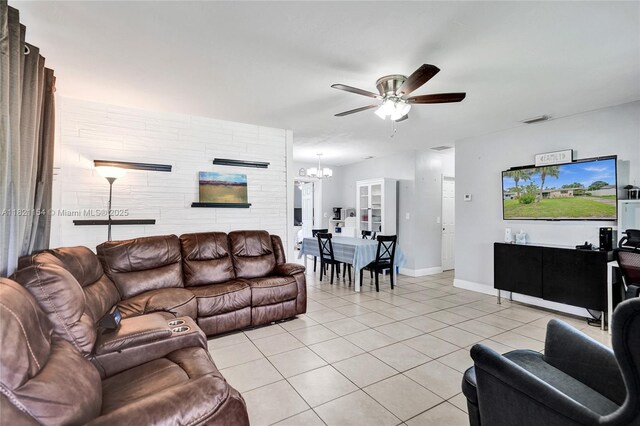 2041 Arcadia Dr, Miramar, FL 33023 - living area featuring ceiling fan, light tile patterned floors, and a chandelier