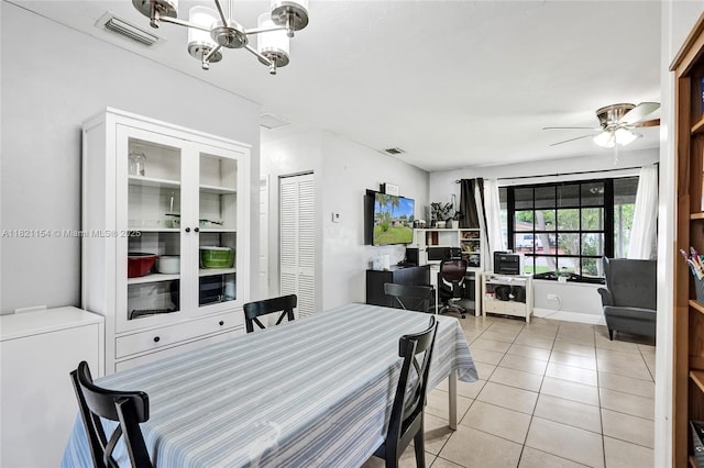 2041 Arcadia Dr, Miramar, FL 33023 - dining room featuring light tile patterned floors, a chandelier, a ceiling fan, and an office area