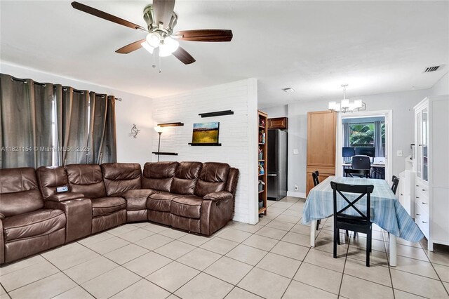 2041 Arcadia Dr, Miramar, FL 33023 - living room with a chandelier, a ceiling fan, and light tile patterned floors