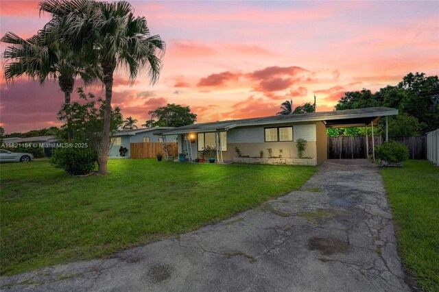 2041 Arcadia Dr, Miramar, FL 33023 - single story home with driveway and a carport
