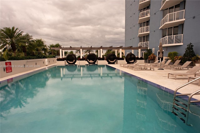 community pool with a patio