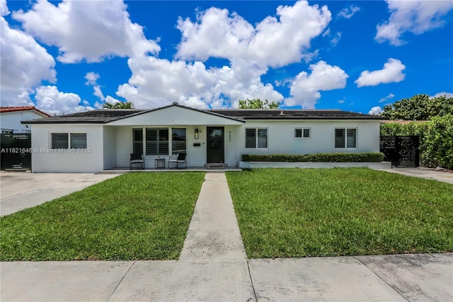 9627 SW 18th Ter, Miami, FL 33165 - ranch-style house with stucco siding and a front lawn