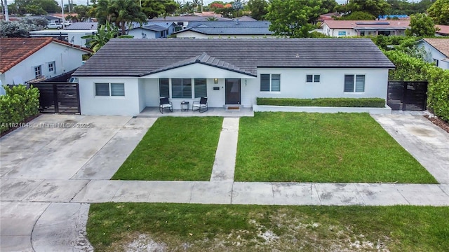 9627 SW 18th Ter, Miami, FL 33165 - single story home featuring stucco siding, a residential view, driveway, and a porch