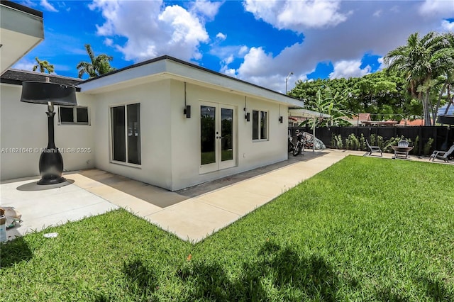 9627 SW 18th Ter, Miami, FL 33165 - rear view of house with a patio, french doors, and stucco siding