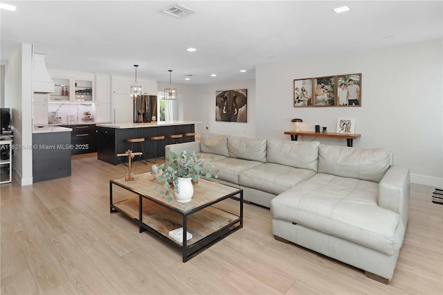 9627 SW 18th Ter, Miami, FL 33165 - living area with light wood-style floors and recessed lighting