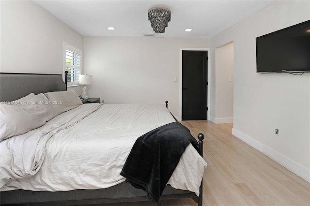 9627 SW 18th Ter, Miami, FL 33165 - bedroom with light wood-style floors and baseboards