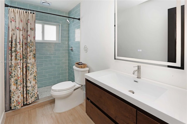 9627 SW 18th Ter, Miami, FL 33165 - full bathroom with vanity, a tile shower, and wood finished floors