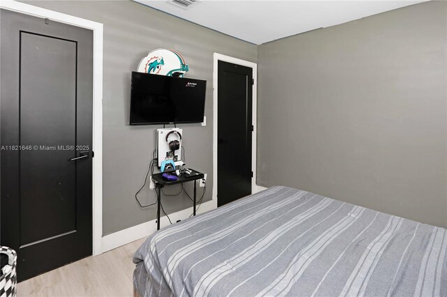9627 SW 18th Ter, Miami, FL 33165 - bedroom featuring light wood finished floors and baseboards