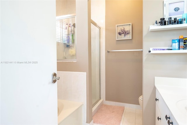 15285 SW 30th Ter, Miami, FL 33185 - bathroom with tile patterned floors, a shower stall, vanity, and a garden tub