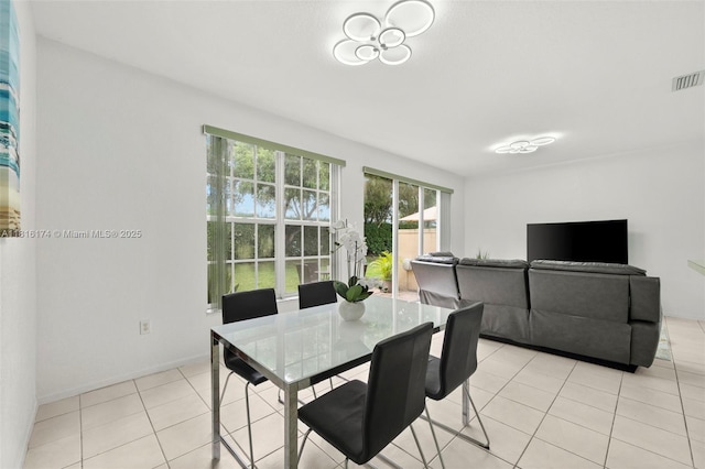1968 NW 79th Way, Pembroke Pines, FL 33024 - dining space with light tile patterned floors and baseboards