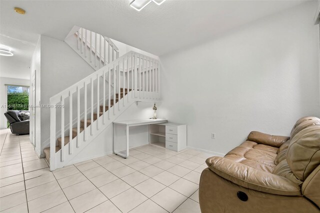 1968 NW 79th Way, Pembroke Pines, FL 33024 - living area with light tile patterned floors and stairway