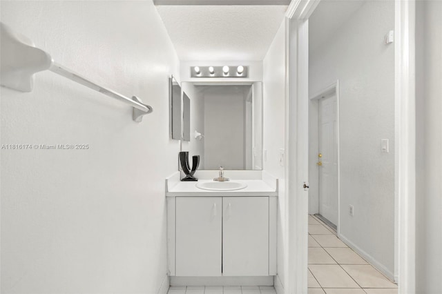 1968 NW 79th Way, Pembroke Pines, FL 33024 - bathroom with vanity, tile patterned floors, and a textured ceiling