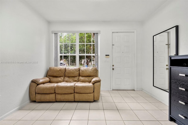 1968 NW 79th Way, Pembroke Pines, FL 33024 - living area featuring light tile patterned flooring and baseboards