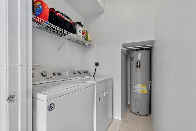 1968 NW 79th Way, Pembroke Pines, FL 33024 - laundry area featuring water heater, washer and clothes dryer, and light tile patterned floors